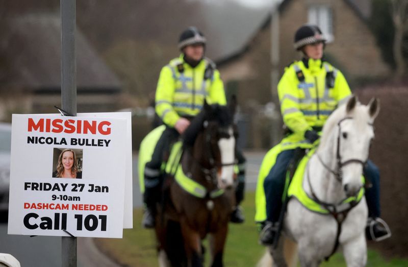 &copy; Reuters. Police officers ride horses near the scene where a body, that is suspected to be missing woman Nicola Bulley, was found, in St Michael's On Wyre, Britain February 20, 2023. REUTERS/Phil Noble