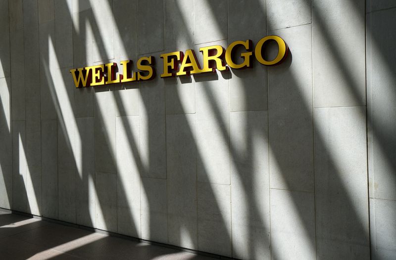 &copy; Reuters. FILE PHOTO: The sign outside the Wells Fargo & Co. bank in downtown Denver April 13, 2016.  REUTERS/Rick Wilking/File Photo/File Photo