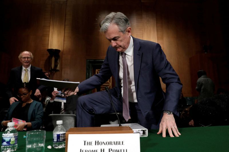 &copy; Reuters. FILE PHOTO: Federal Reserve Board Chairman Jerome Powell steps over a chair after a Senate Banking Committee hearing on The Semiannual Monetary Policy Report to the Congress on Capitol Hill in Washington, U.S., February 12, 2020. REUTERS/Yuri Gripas/File 