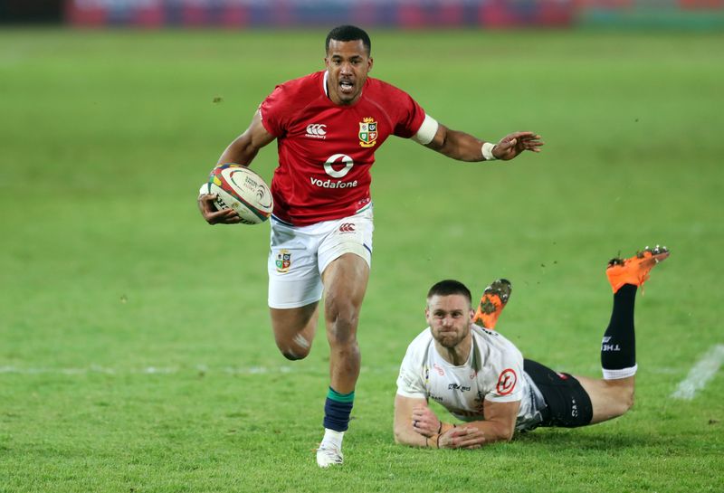 &copy; Reuters. FILE PHOTO: Rugby Union - Lions Tour - Sharks v British and Irish Lions - Loftus Versfeld Stadium, Pretoria, South Africa - July 10, 2021 British and Irish Lions' Anthony Watson in action with Sharks' Cameron Wright REUTERS/Siphiwe Sibeko