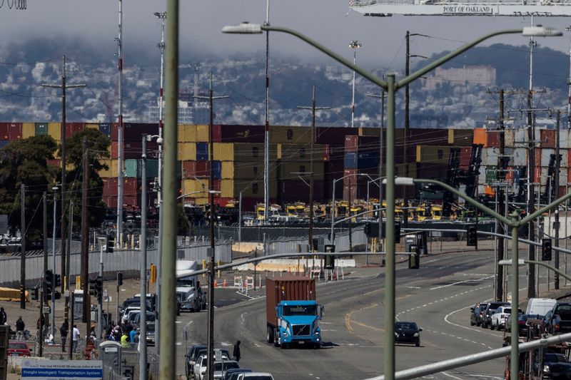 &copy; Reuters. FILE PHOTO: Shipping containers are seen at a terminal inside the Port of Oakland as truck drivers continue protesting against California's new law known as AB5, in Oakland, California, U.S., July 21, 2022. REUTERS/Carlos Barria