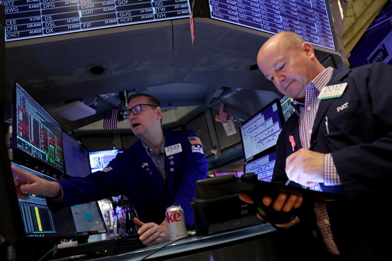 &copy; Reuters. FILE PHOTO: Traders work on the floor of the New York Stock Exchange (NYSE) in New York City, U.S., February 17, 2023.  REUTERS/Brendan McDermid