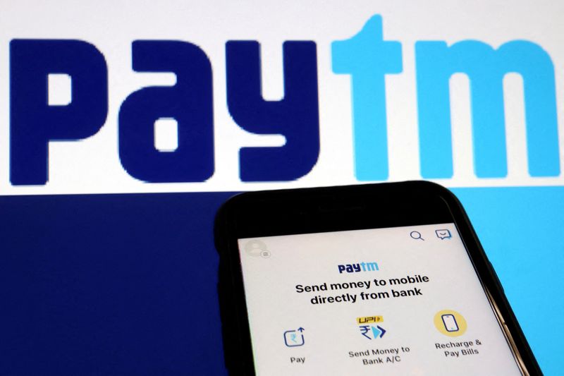 &copy; Reuters. FILE PHOTO: The interface of Indian payments app Paytm is seen in front of its logo displayed in this illustration picture taken July 7, 2021. REUTERS/Florence Lo/Illustration