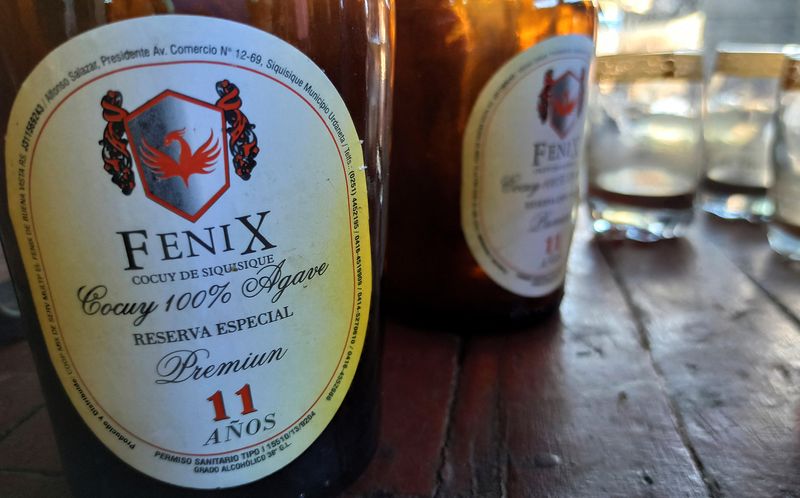 &copy; Reuters. Bottles of Fenix cocuy, an artisanal Venezuelan liquor made from agave, which is on the rise after winning various prizes at international beverage competitions, are seen at a local business in Siquisique, Venezuela February 3, 2023. REUTERS/Keren Torres