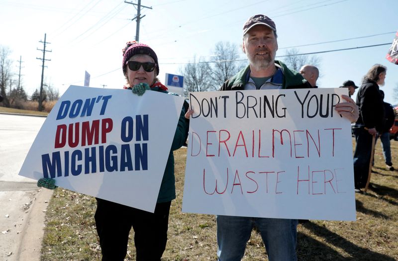 &copy; Reuters. FILE PHOTO: Local residents Peggy and Mark Vaeth protest against the disposal of hazardous materials from the Ohio train derailment to the Republic and Energy hazardous waste facility in Romulus, Michigan U.S. February 26, 2023. REUTERS/Rebecca Cook