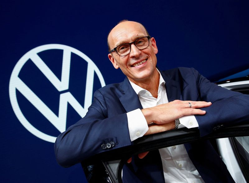 &copy; Reuters. FILE PHOTO: Ralf Brandstaetter, CEO of the Volkswagen Passenger Cars brand gestures in front of the revised logo of German carmaker Volkswagen AG during a preview of the world's biggest automaker at the international Frankfurt Motor Show IAA in Frankfurt,