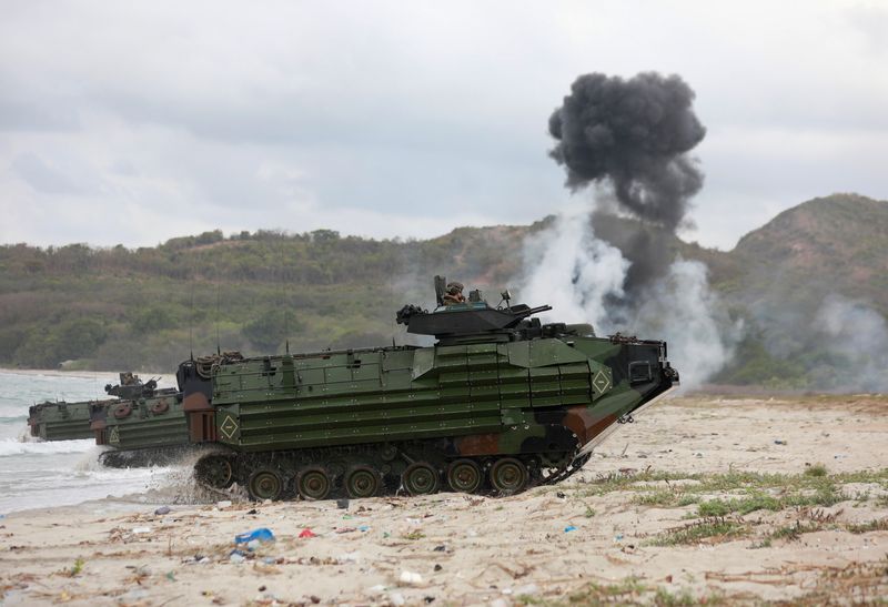 © Reuters. Tanks take part in the Amphibious Assault Demonstration during the Cobra Gold multilateral military exercise in Hat Yao Beach, Sattahip District, Chonburi Province, Thailand February 28, 2020. REUTERS/Soe Zeya Tun