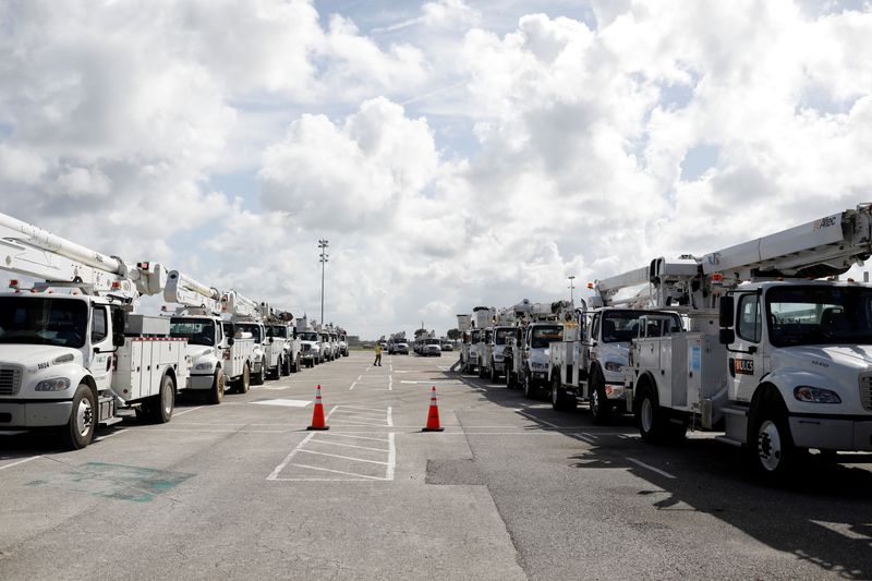 &copy; Reuters. FILE PHOTO: Trucks of the Florida Power & Light Company (FPL) are seen ahead of the arrival of Hurricane Dorian in Daytona Beach, Florida, U.S. August 31, 2019.  REUTERS/Marco Bello/File Photo