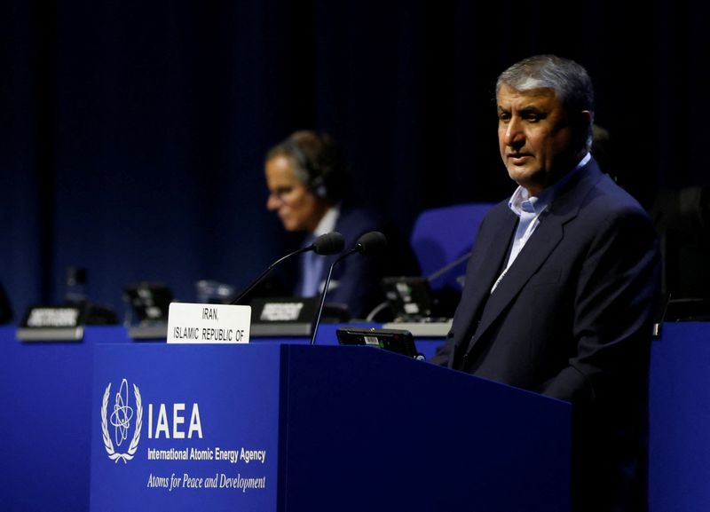 &copy; Reuters. FILE PHOTO: Head of Atomic Energy Organization of Iran Mohammad Eslami and International Atomic Energy Agency Director General Rafael Grossi attend the opening of the IAEA General Conference at their headquarters in Vienna, Austria, September 26, 2022. RE