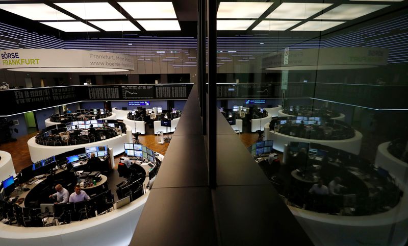 &copy; Reuters. FILE PHOTO: A general view shows the trading floor at the stock exchange reflected in a window of the visitors terrace in Frankfurt, Germany October 2, 2017. REUTERS/Kai Pfaffenbach