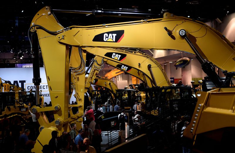 &copy; Reuters. FILE PHOTO: A row of excavators are seen at the Caterpillar booth at the CONEXPO-CON/AGG convention at the Las Vegas Convention Center in Las Vegas, Nevada, U.S. March 9, 2017. REUTERS/David Becker/File Photo