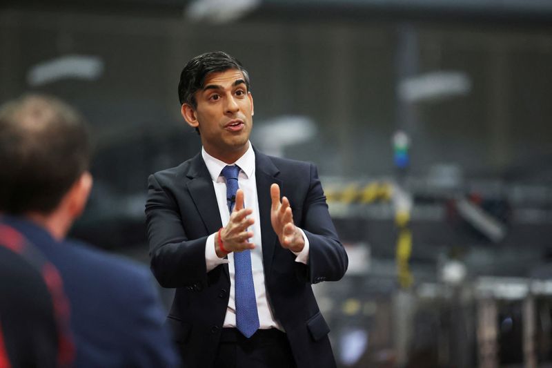 &copy; Reuters. Prime Minister Rishi Sunak holds a Q&A session with local business leaders during a visit to Coca-Cola HBC in Lisburn, Co Antrim in Northern Ireland, February 28, 2023. Liam McBurney/Pool via REUTERS