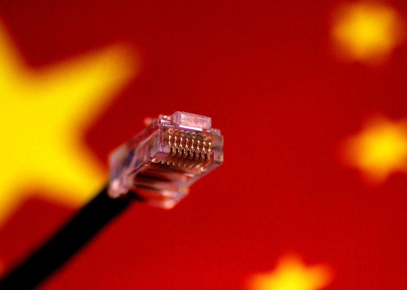 &copy; Reuters. Cabo de rede de computador é visto acima de uma bandeira da China
12/07/2017
REUTERS/Thomas White/File Photo