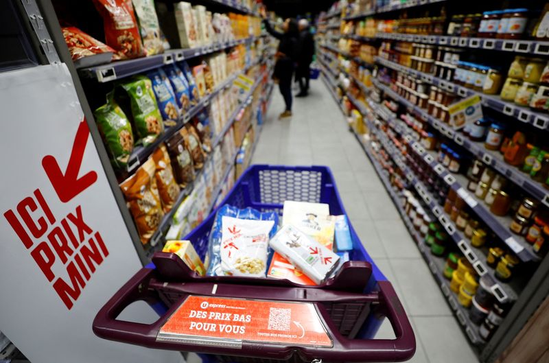 &copy; Reuters. FILE PHOTO: A sign reading "Low prices for you"  is seen on a shopping trolley in a supermarket in Nice, France, March 1, 2023.    REUTERS/Eric Gaillard