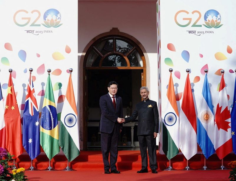 &copy; Reuters. Chinese Foreign Minister Qin Gang and India's Foreign Minister Subrahmanyam Jaishankar shake hands before the start of G20 foreign ministers' meeting in New Delhi, India, March 2, 2023. India's Ministry of External Affairs/Handout via REUTERS  