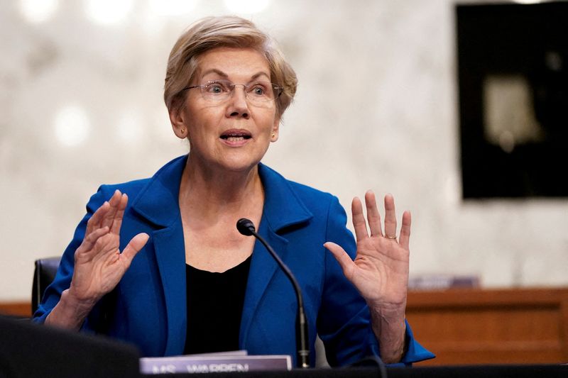 &copy; Reuters. FILE PHOTO: U.S. Senator Elizabeth Warren (D-MA) gestures as Federal Reserve Chair Jerome Powell testifies before a Senate Banking, Housing, and Urban Affairs Committee hearing on the "Semiannual Monetary Policy Report to the Congress", on Capitol Hill in