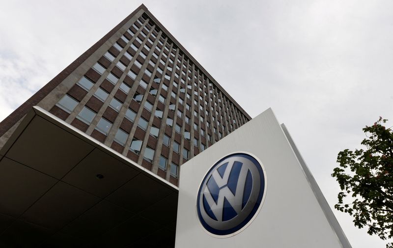 © Reuters. FILE PHOTO: A VW logo is seen in front of the main building of the Volkswagen brand at the Volkswagen headquarters during a media tour to present Volkswagen's so called 