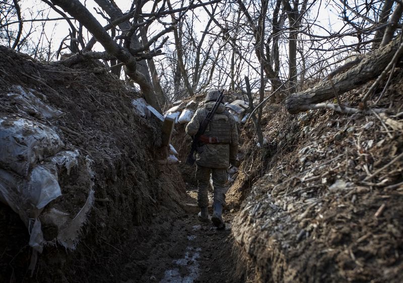&copy; Reuters. A Ukrainian service member is seen in a trench at a position outside the frontline town of Horlivka, amid Russia's attack on Ukraine, in Donetsk region, Ukraine March 3, 2023. REUTERS/Anna Kudriavtseva