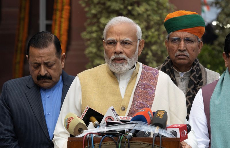 © Reuters. FILE PHOTO: India's Prime Minister Narendra Modi speaks with the media inside the parliament premises upon his arrival on the first day of the budget session in New Delhi, India, January 31, 2023. REUTERS/Adnan Abidi