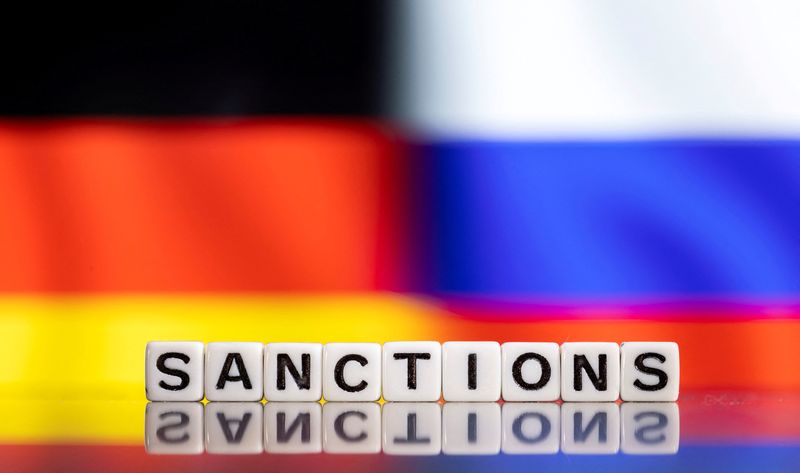 &copy; Reuters. FILE PHOTO: Plastic letters arranged to read "Sanctions" are placed in front of German and Russian flag colors  in this illustration taken February 25, 2022. REUTERS/Dado Ruvic/Illustration/File Photo