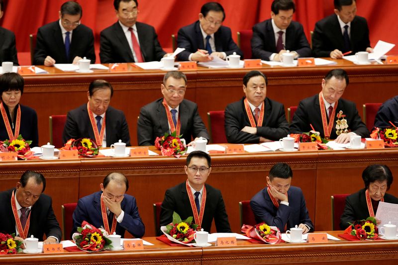 © Reuters. FILE PHOTO: Tencent's Chief Executive Officer Pony Ma, Alibaba's Executive Chairman Jack Ma and others attend an event marking the 40th anniversary of China's reform and opening up at the Great Hall of the People in Beijing, China December 18, 2018. REUTERS/Jason Lee/File Photo