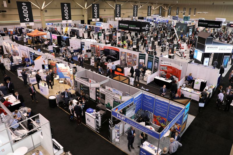 &copy; Reuters. FILE PHOTO: Visitors crowd booths at at the Prospectors and Developers Association of Canada (PDAC) annual conference in Toronto, Ontario, Canada March 1, 2020.  REUTERS/Chris Helgren/File Photo