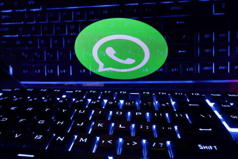 &copy; Reuters. FILE PHOTO: A keyboard is placed in front of a displayed WhatsApp logo in this illustration taken February 21, 2023. REUTERS/Dado Ruvic/Illustration