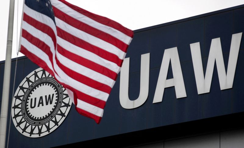 &copy; Reuters. FILE PHOTO: An American flag flies in front of the United Auto Workers union logo on the front of the UAW Solidarity House in Detroit, Michigan, September 8, 2011. Rebecca Cook/File Photo