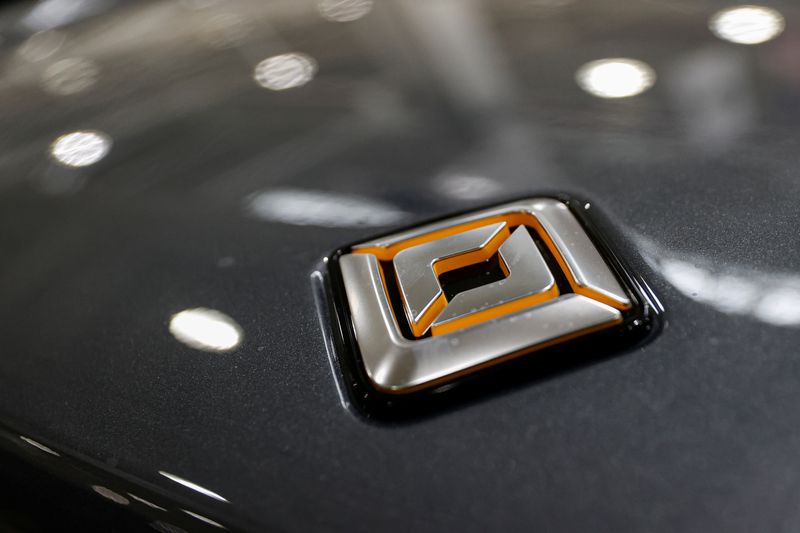&copy; Reuters. FILE PHOTO: The logo of startup Rivian Automotive's is seen at the electric vehicle factory in Normal, Illinois, U.S. April 11, 2022. Picture taken April 11, 2022.  REUTERS/Kamil Krzaczynski