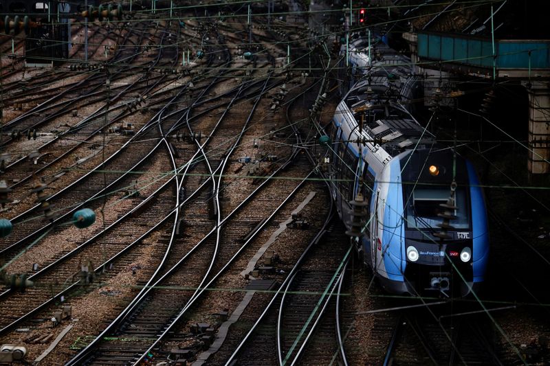 &copy; Reuters. FILE PHOTO: Suburban trains are seen at the Saint-Lazare train station in Paris on the eve of the sixth nationwide day of strike and protests against the pension reform in France with heavy disruption on French SNCF railway and the Paris transport RATP ne