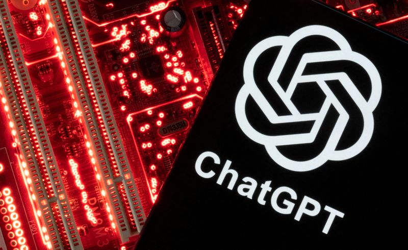 &copy; Reuters. FILE PHOTO: A smartphone with a displayed ChatGPT logo is placed on a computer motherboard in this illustration taken February 23, 2023. REUTERS/Dado Ruvic/Illustration/File Photo