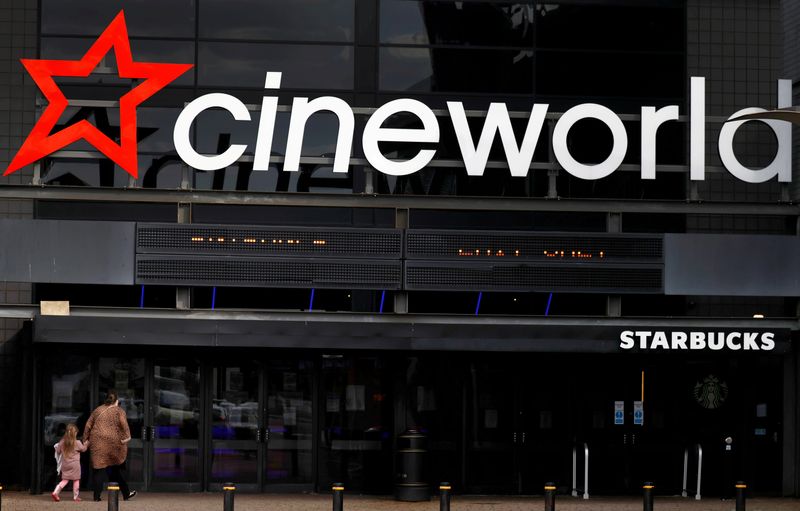&copy; Reuters. FILE PHOTO: People enter a Cineworld cinema following the outbreak of the coronavirus disease near Manchester, Britain, October 4, 2020. REUTERS/Phil Noble