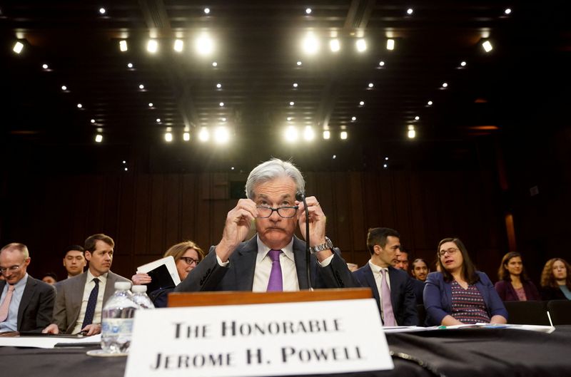 © Reuters. Federal Reserve Chair Jerome H. Powell takes his seat to testify before a U.S. Senate Banking, Housing, and Urban Affairs Committee hearing on 