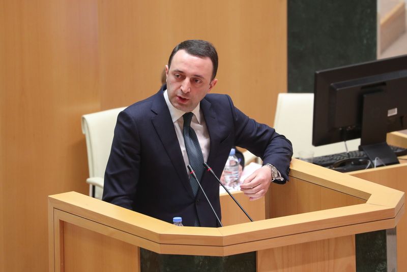 &copy; Reuters. Irakli Garibashvili, Georgia's Defence Minister and a candidate to replace Prime Minister Giorgi Gakharia who recently announced his resignation, delivers a speech during a session of parliament in Tbilisi, Georgia February 22, 2021. REUTERS/Irakli Gedeni