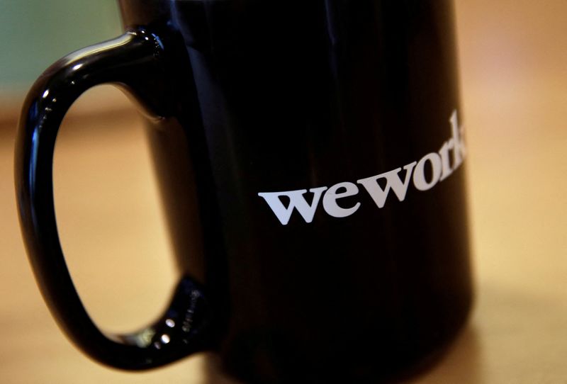 &copy; Reuters. FILE PHOTO: The WeWork logo is seen on a cup at a WeWork office in Beijing, China August 2, 2019. Picture taken August 2, 2019. REUTERS/Jason Lee/File Photo