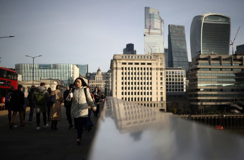 &copy; Reuters. People walk over London Bridge during morning rush hour, with City of London financial district in the background, in London, Britain, February 10, 2023. REUTERS/Henry Nicholls