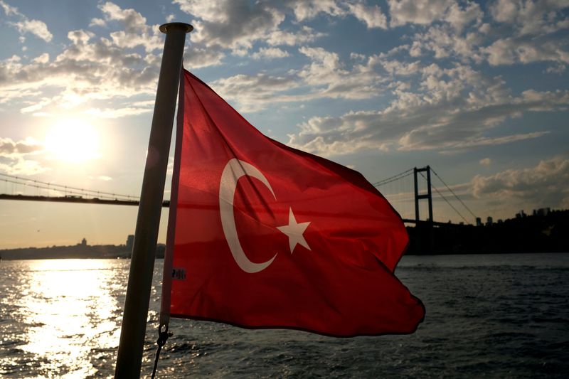 &copy; Reuters. FILE PHOTO: A Turkish flag with the Bosphorus Bridge in the background, flies on a passenger ferry in Istanbul, Turkey September 30, 2020. REUTERS/Murad Sezer