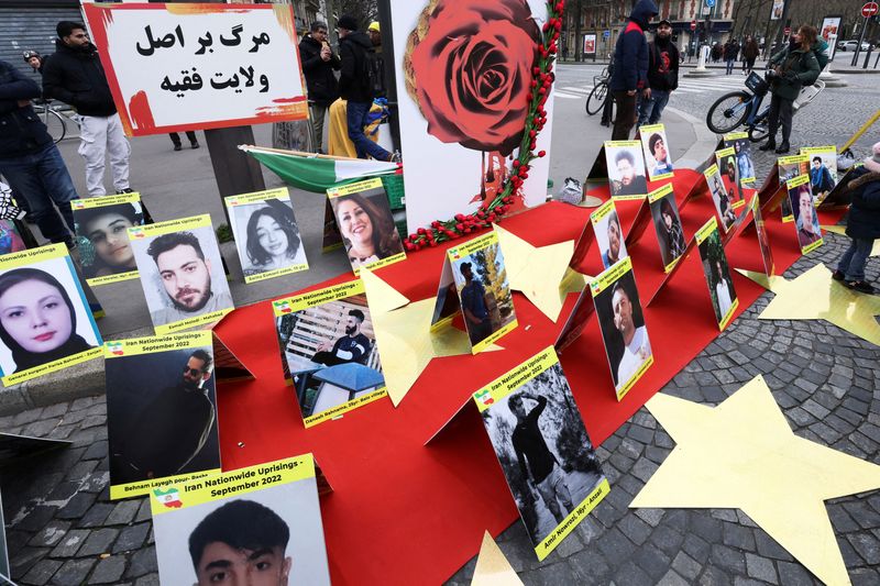 &copy; Reuters. FILE PHOTO: Pictures of people who died during demonstrations in Iran are displayed as Iranian community members and supporters of the National Council of Iran take part in a protest in solidarity with Iranian people, in Paris, France, February 12, 2023. 