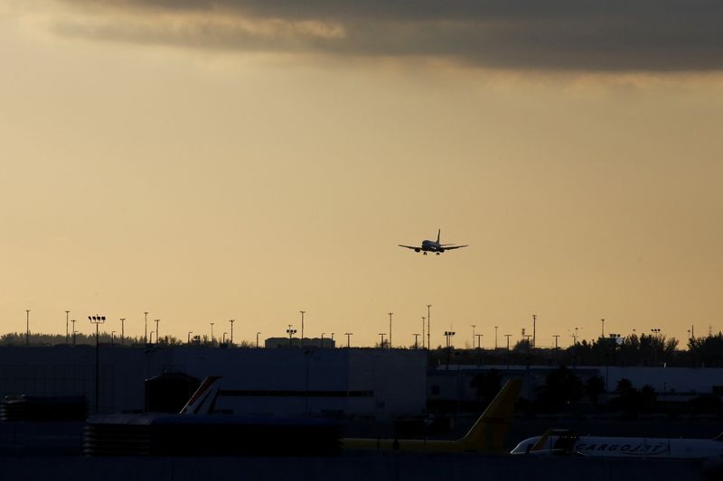 &copy; Reuters. An aircraft approaches to land at Miami International Airport after the Federal Aviation Administration (FAA) said it had slowed the volume of airplane traffic over Florida due to an air traffic computer issue, in Miami, Florida, U.S. January 2, 2023.  RE