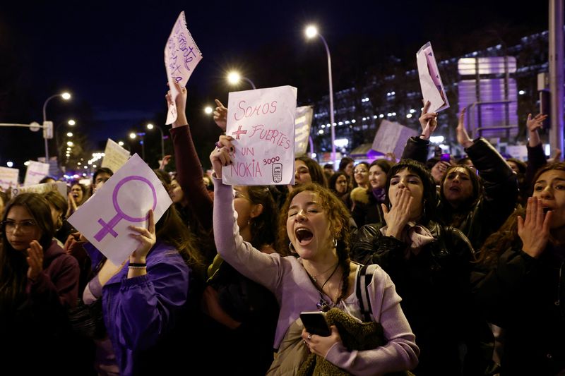 © Reuters. People take part in a protest to mark International Women's Day in Madrid, Spain, March 8, 2023. REUTERS/Juan Medina