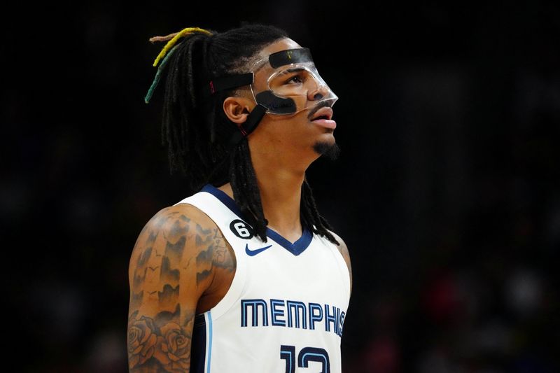 &copy; Reuters. FILE PHOTO: Mar 3, 2023; Denver, Colorado, USA; Memphis Grizzlies guard Ja Morant (12) looks on in the second quarter against the Denver Nuggets at Ball Arena. Mandatory Credit: Ron Chenoy-USA TODAY Sports/File Photo