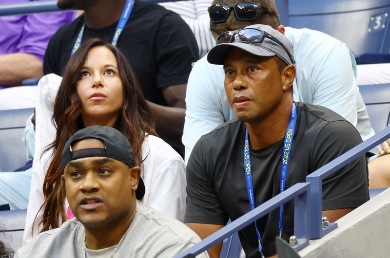 &copy; Reuters. FILE PHOTO: Tennis - U.S. Open - Flushing Meadows, New York, United States - August 31, 2022 Golfer Tiger Woods in the stand before the second round match between Serena Williams of the U.S. and Estonia's Anett Kontaveit REUTERS/Mike Segar/File Photo