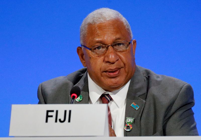 &copy; Reuters. FILE PHOTO: Fiji's then Prime Minister Josaia Voreqe 'Frank' Bainimarama attends a meeting during the UN Climate Change Conference (COP26) in Glasgow, Scotland, Britain, November 2, 2021. REUTERS/Phil Noble/Pool