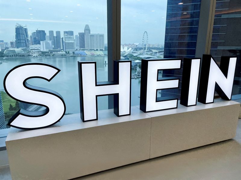 &copy; Reuters. FILE PHOTO: A Shein logo is pictured at the company's office in the central business district of Singapore, October 18, 2022. REUTERS/Chen Lin
