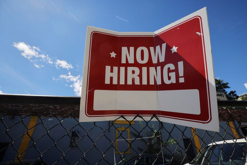 &copy; Reuters. FILE PHOTO: A "now hiring" sign is displayed outside Taylor Party and Equipment Rentals in Somerville, Massachusetts, U.S., September 1, 2022.     REUTERS/Brian Snyder