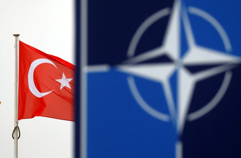 &copy; Reuters. FILE PHOTO: A Turkish flag flies next to NATO logo at the Alliance headquarters in Brussels, Belgium, November 26, 2019.  REUTERS/Francois Lenoir/File Photo