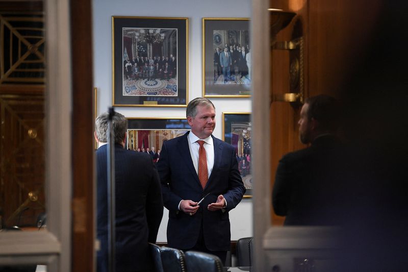 © Reuters. Norfolk Southern CEO Alan Shaw waits to testify on the East Palestine, Ohio train derailment before a U.S. Senate Environment and Public Works Committee hearing on Capitol Hill, in Washington, U.S., March 9, 2023. REUTERS/Mary F. Calvert