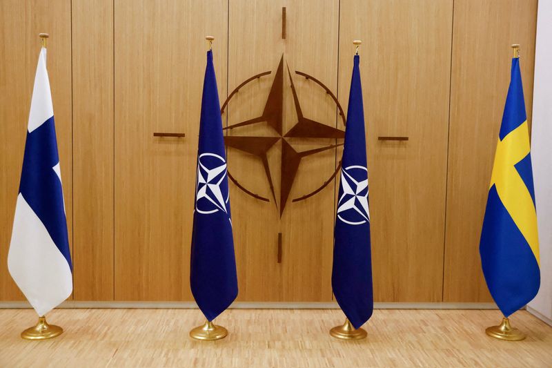 &copy; Reuters. FILE PHOTO: A view of the flags of Finland, NATO and Sweden during a ceremony to mark Sweden's and Finland's application for membership in Brussels, Belgium, May 18, 2022. REUTERS/Johanna Geron/Pool