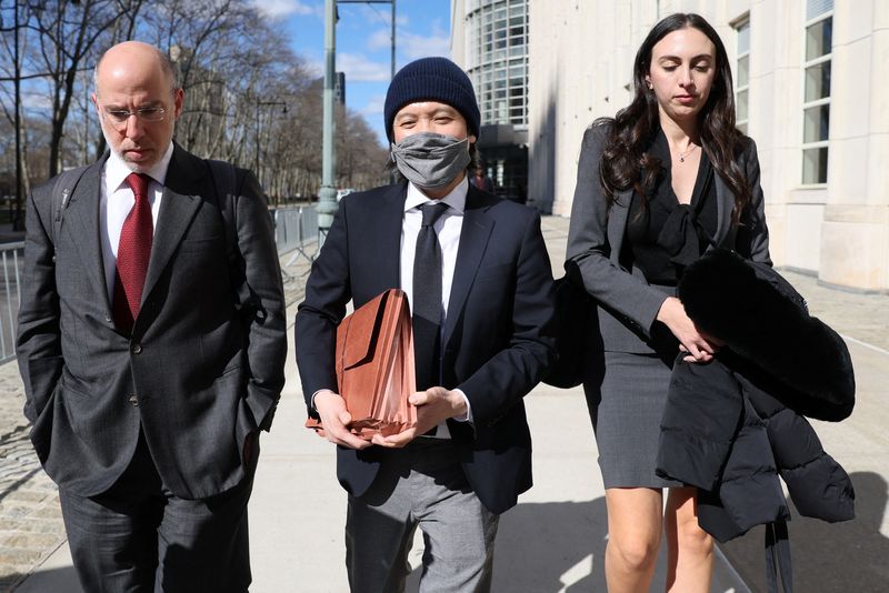 © Reuters. Ex-Goldman Sachs banker Roger Ng exits the Brooklyn Federal Courthouse (EDNY) after being sentenced for his part helping embezzle from Malaysia's 1MDB sovereign wealth fund, in Brooklyn, New York, U.S., March 9, 2023.  REUTERS/Brendan McDermid