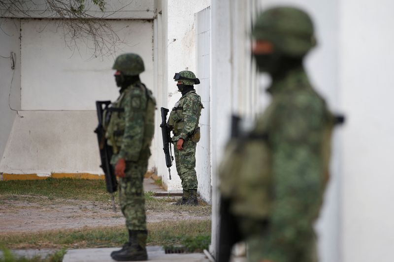 Mexican cartel says sorry for attack on Americans, serves up five suspects